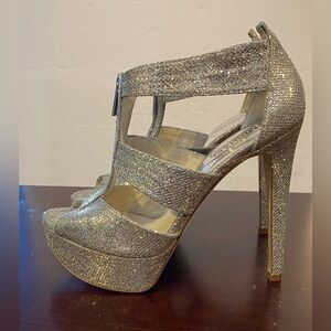 Michael Kors Silver lamé zip platform heels 9